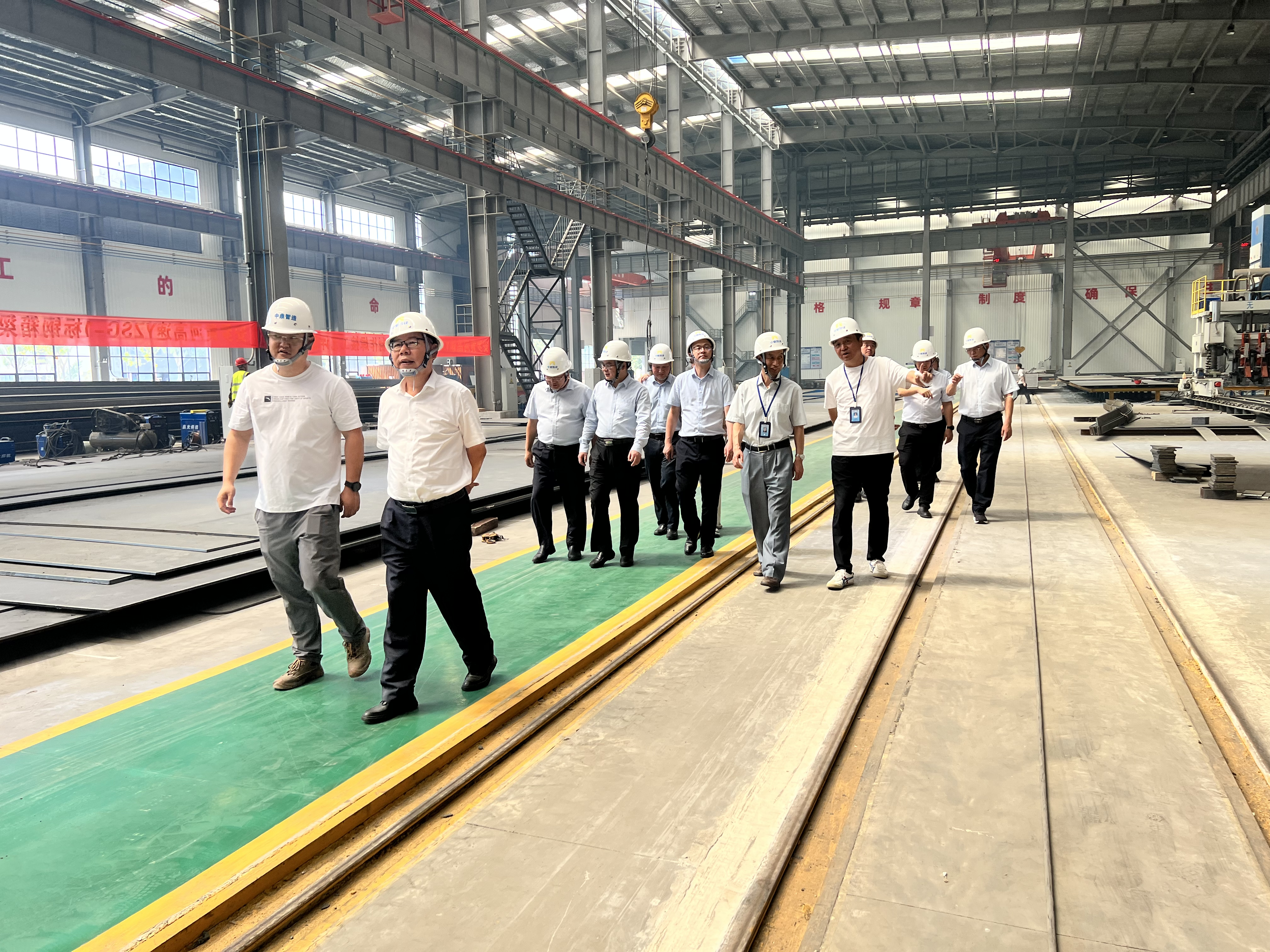 中铁九桥工程有限公司董事长王员根一行来公司 交流座谈，并前往中鼎智建考察调研